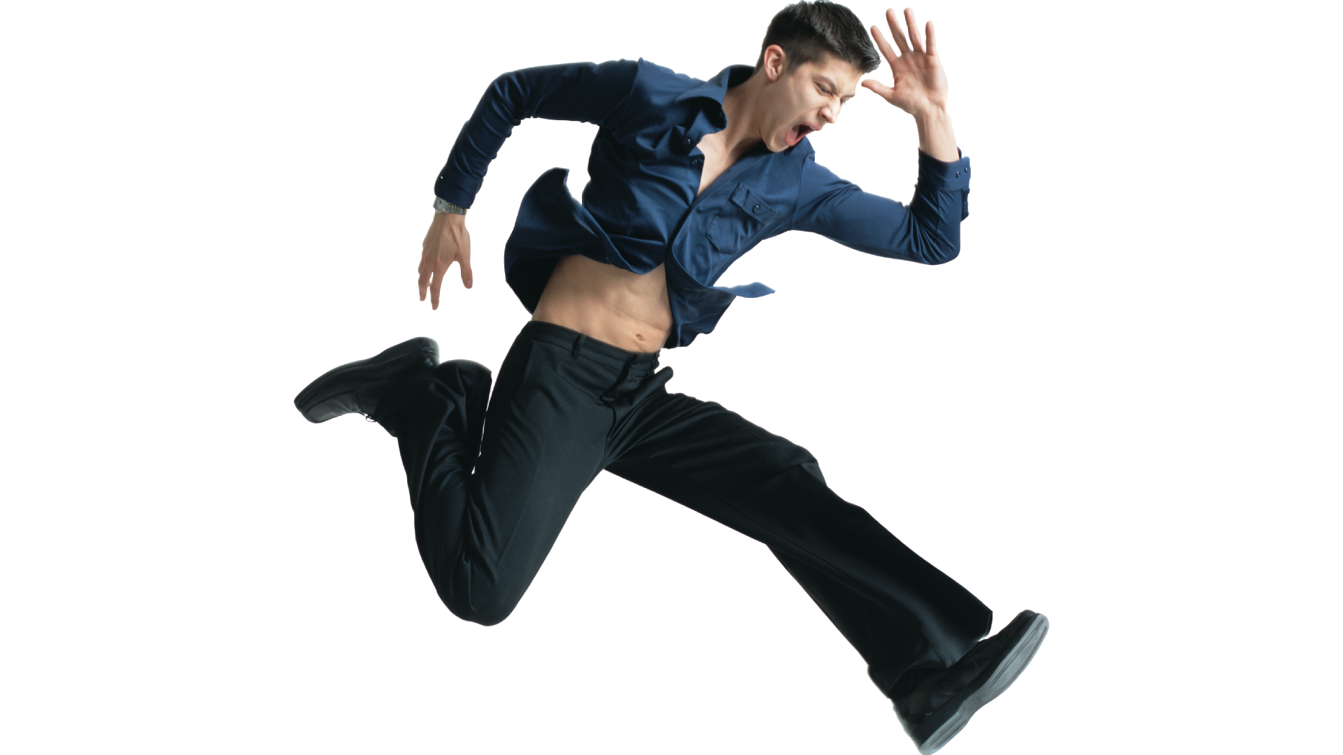  a man jumping in the air with a blue shirt, black pants, and black shoes